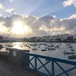 Casa Pescado y mariposas