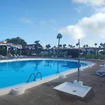 Bungalow 1 Maspalomas Golf con piscina y jardín
