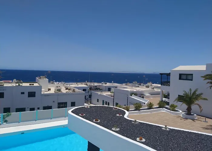 Apartamento Portonovo La Paloma - increíble vista mar y piscina - casco antiguo - free wifi -AC- parking