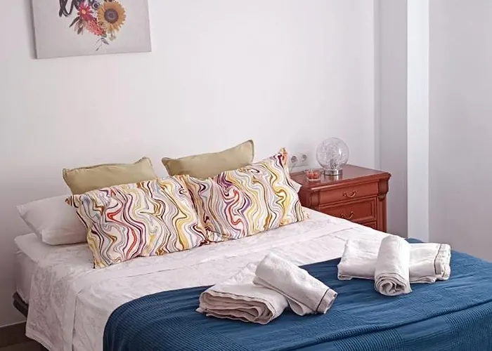 confortable y luminoso piso 5 camas, parking gratis