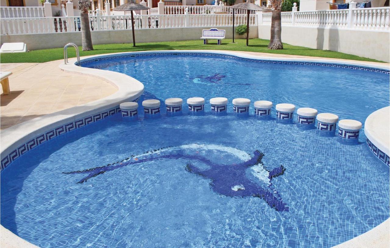 Сasa de vacaciones Awesome In Cabo Roig, With 2 Bedrooms, Wifi And Outdoor Swimming Pool *