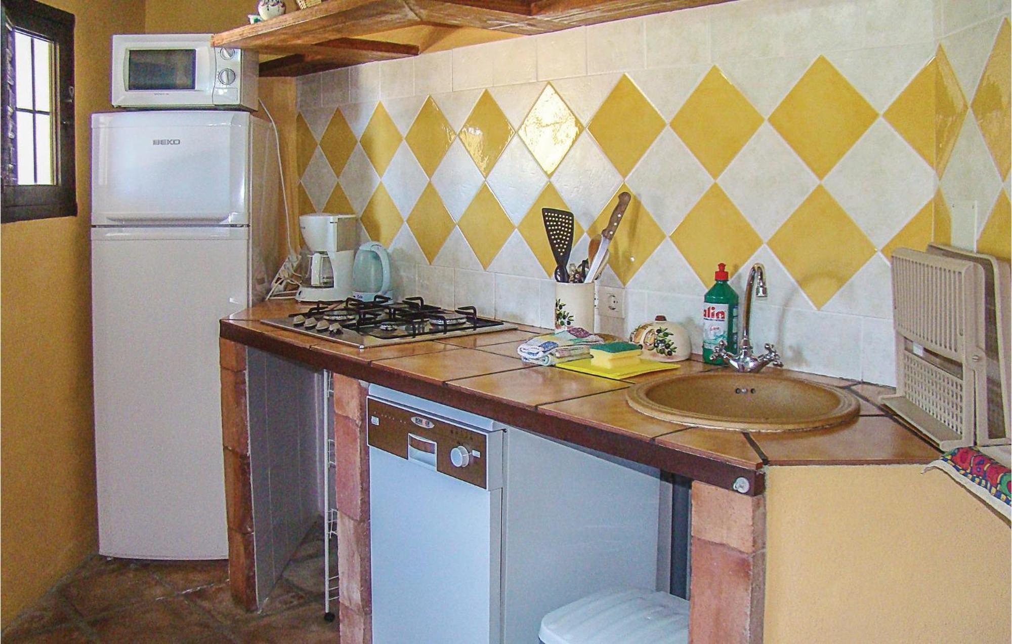 Сasa de vacaciones Cozy In El With Kitchen Borge