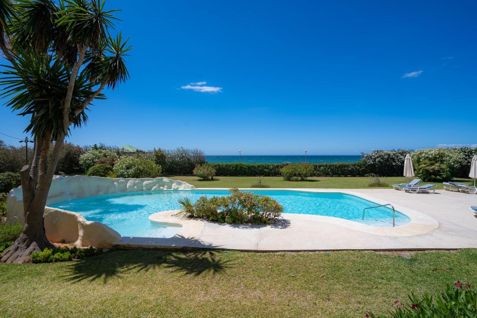 Beachfront Neptuno I, Complex,views,pool,garden, Elviria * Marbella