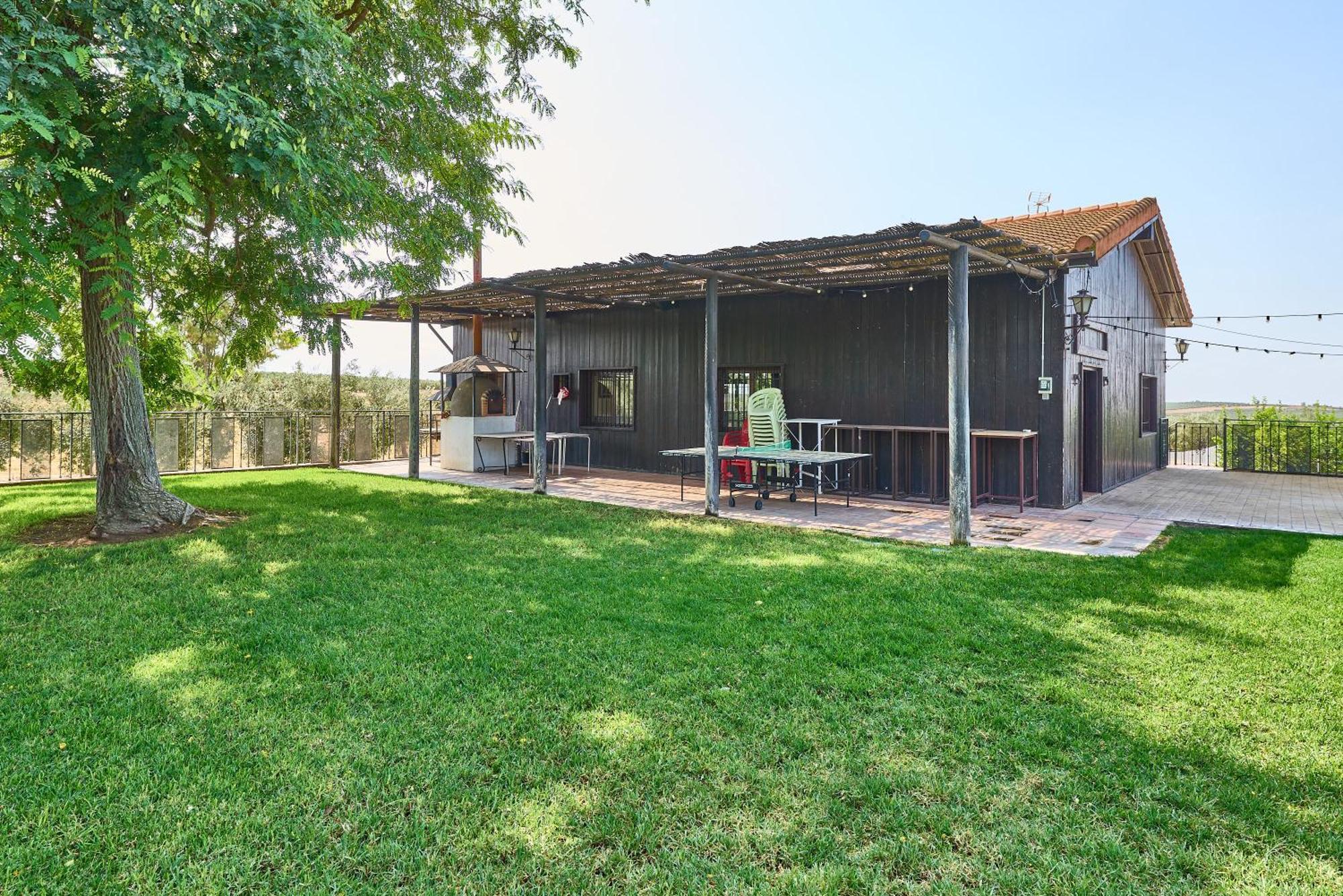 La Piscina Y Jardin Holiday home La Carlota