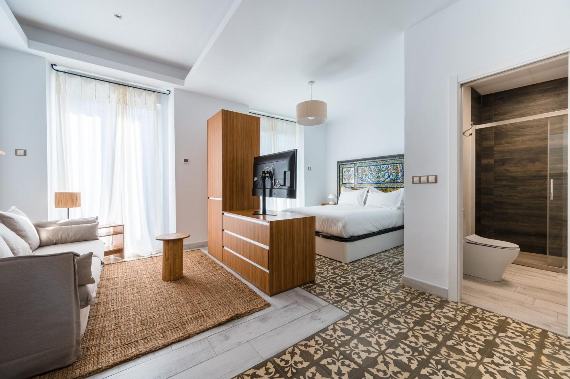 Apartahotel El Escondite De Triana