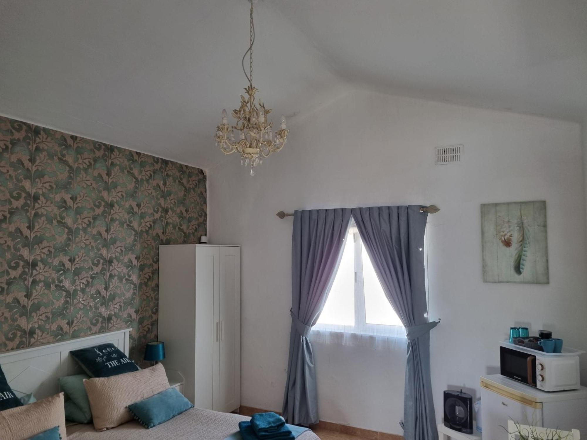 Habitación en casa particular Feliza Güime