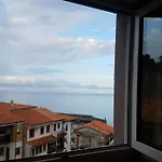 La casina del Reloj con vistas al mar
