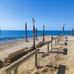 Primera línea de mar con piscina, gimnasio y parking 2 hab y 2 baños