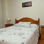 Apartamentos Chevere Rojo-Huca