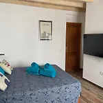 Casa pescado, madera y sol