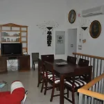 Apartamentos La Casa Pintada