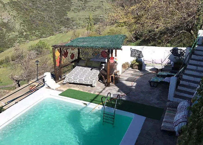 Cortijo en Bubion Casa Ibero Slow Alojamiento turistico rural VTAR GR 00516/ 00555