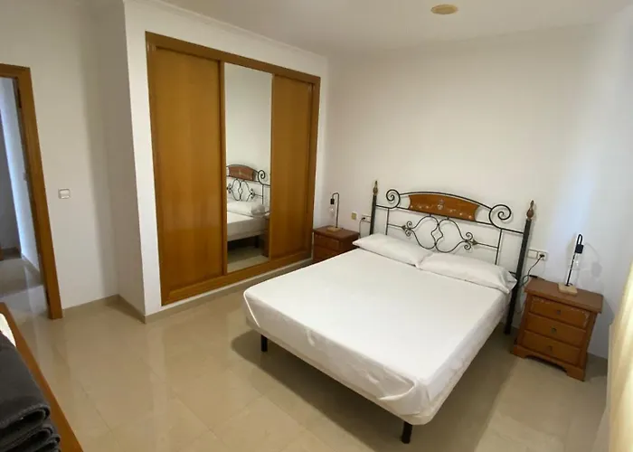 Apartamento De 2 Dormitorios At1 En Sanxenxo Con Vistas Al Mar Y Piscina