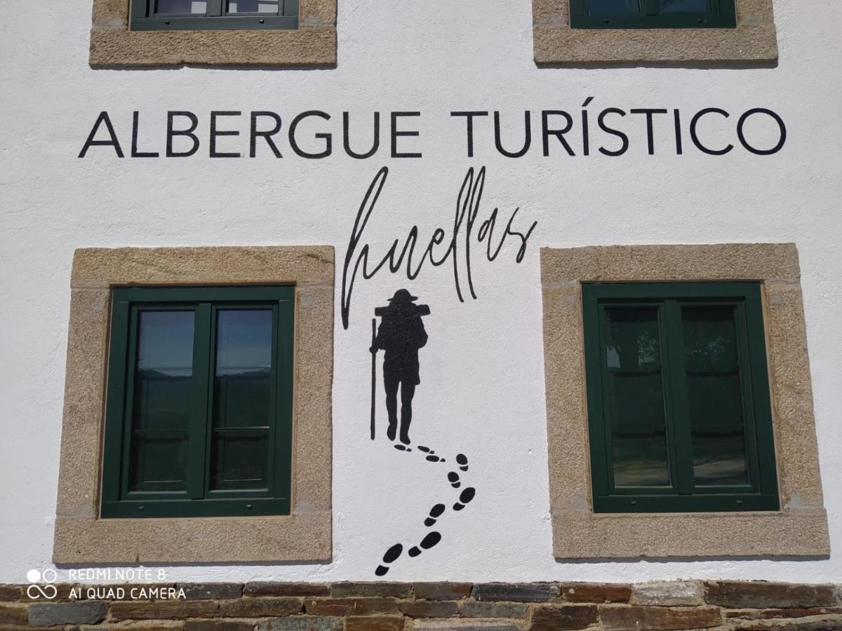 Huellas Albergue-turístico Portomarín