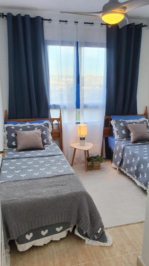 In Overlooking The Swimming Pool Campoamor