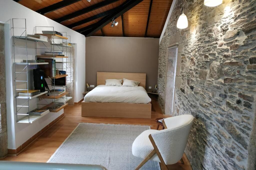 Holiday home A Casa Do Tragaluz Casa Rural Con Restauracion De Diseno En *