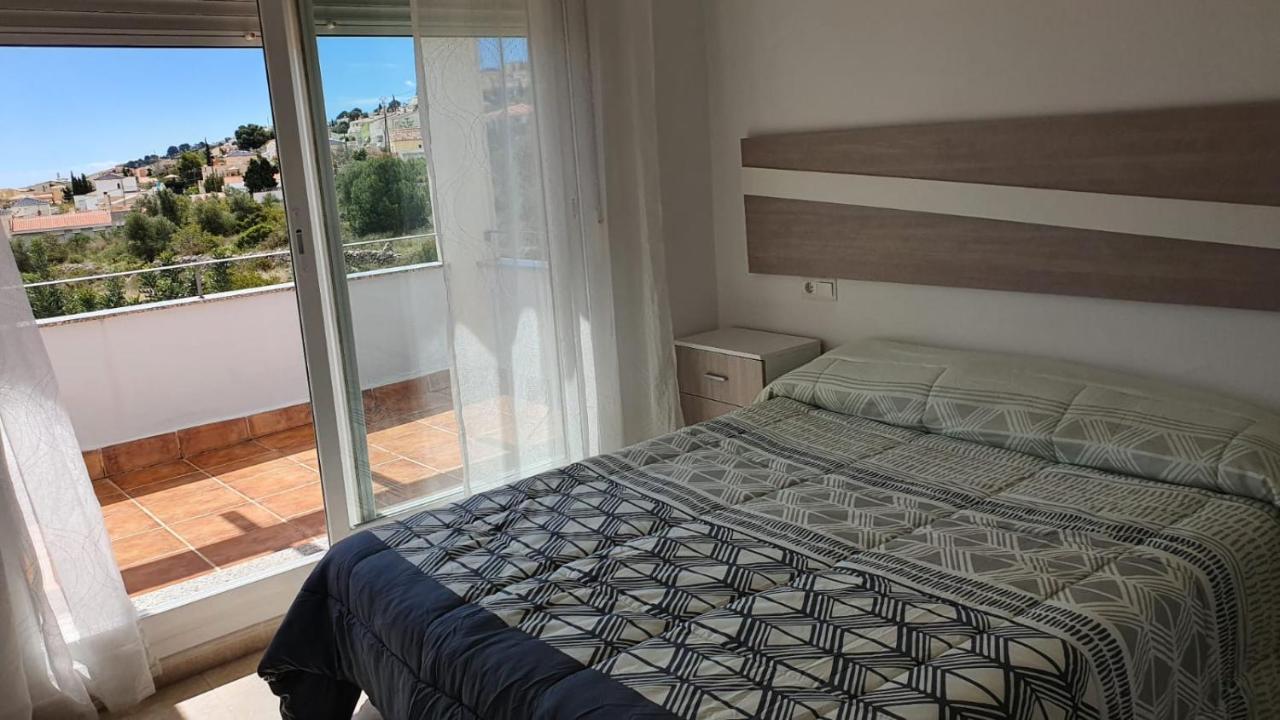 Holiday home Cala House Ii Luminoso Adosado Con Vistas,piscina Comunitaria Y Parking Incluido