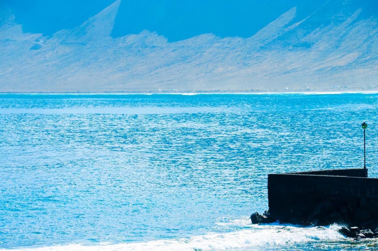 Arena Y El Mar