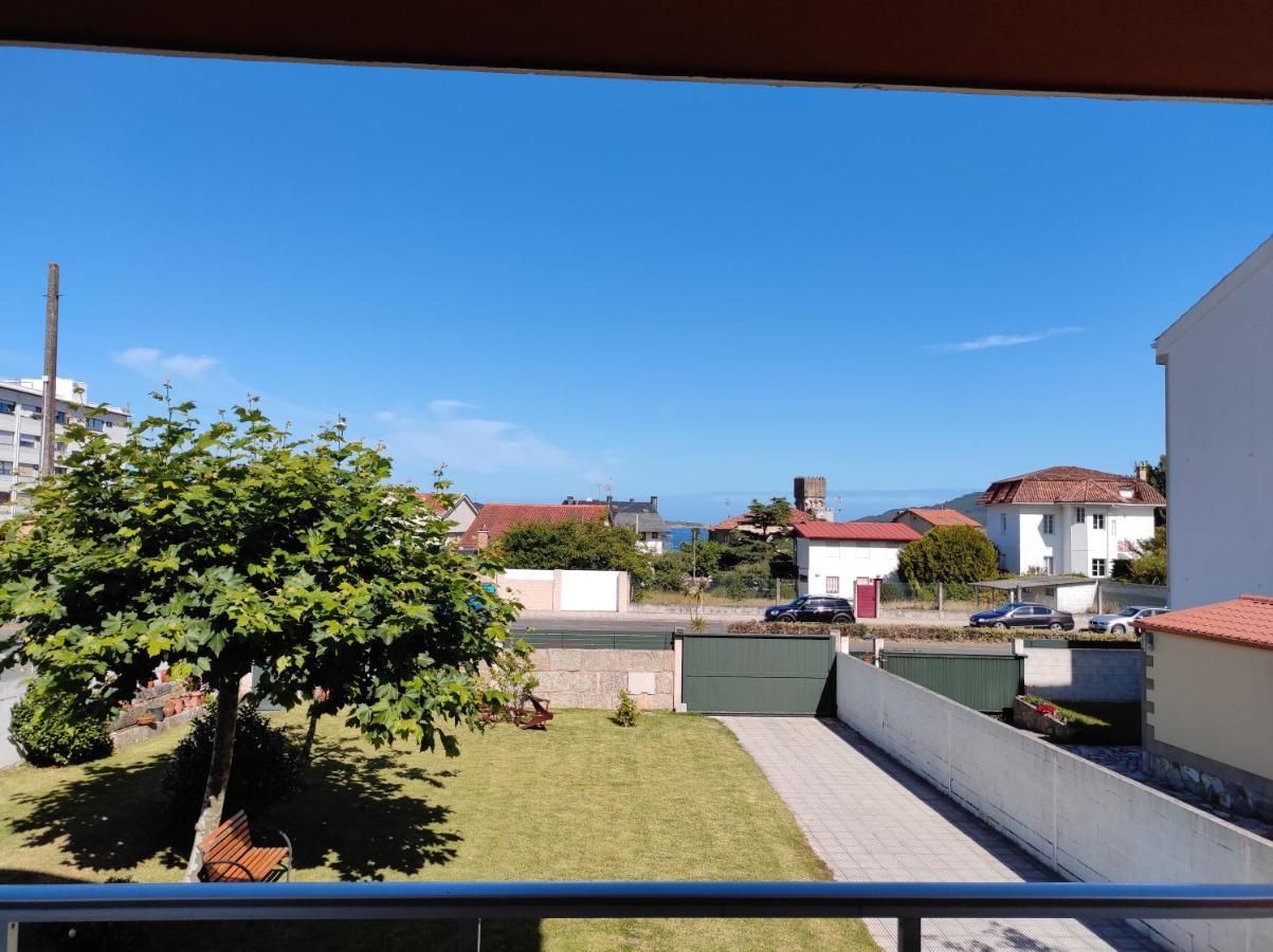 Precioso Piso En Playa America Con Jardin Privado.