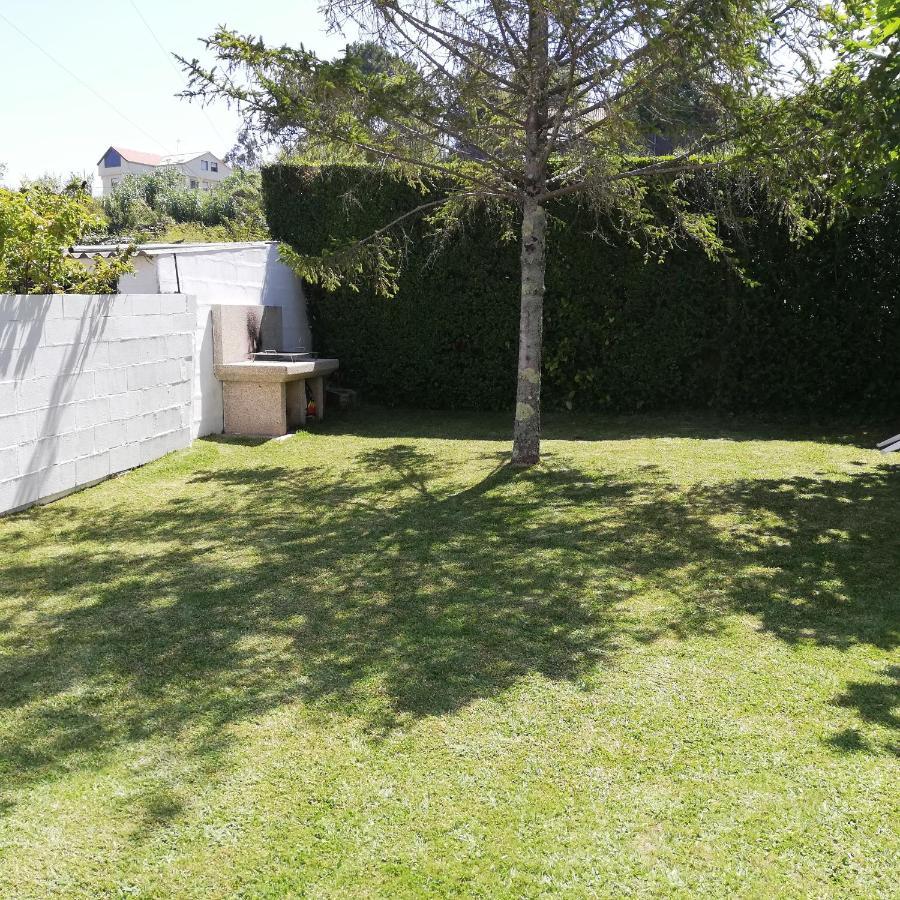 Precioso Piso En Playa America Con Jardin Privado.