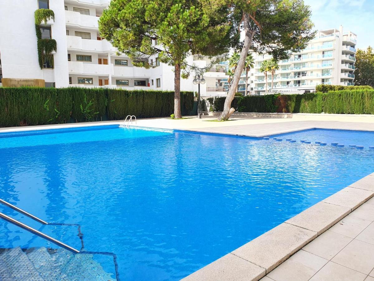 SALOU,Carrer de París, playa centro. Piscina. Apartamento Salou