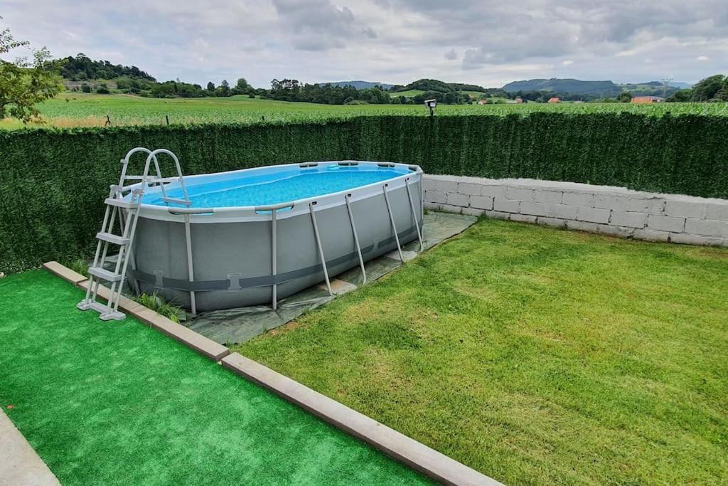 Comoda Y Amplia Planta Baja Con Jardin Cerca De Todo Сasa de vacaciones Entrambasaguas (Entrambasaguas)