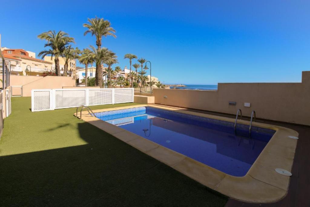 Aticos Primera Linea Con Piscina By Rent Me Apartamento