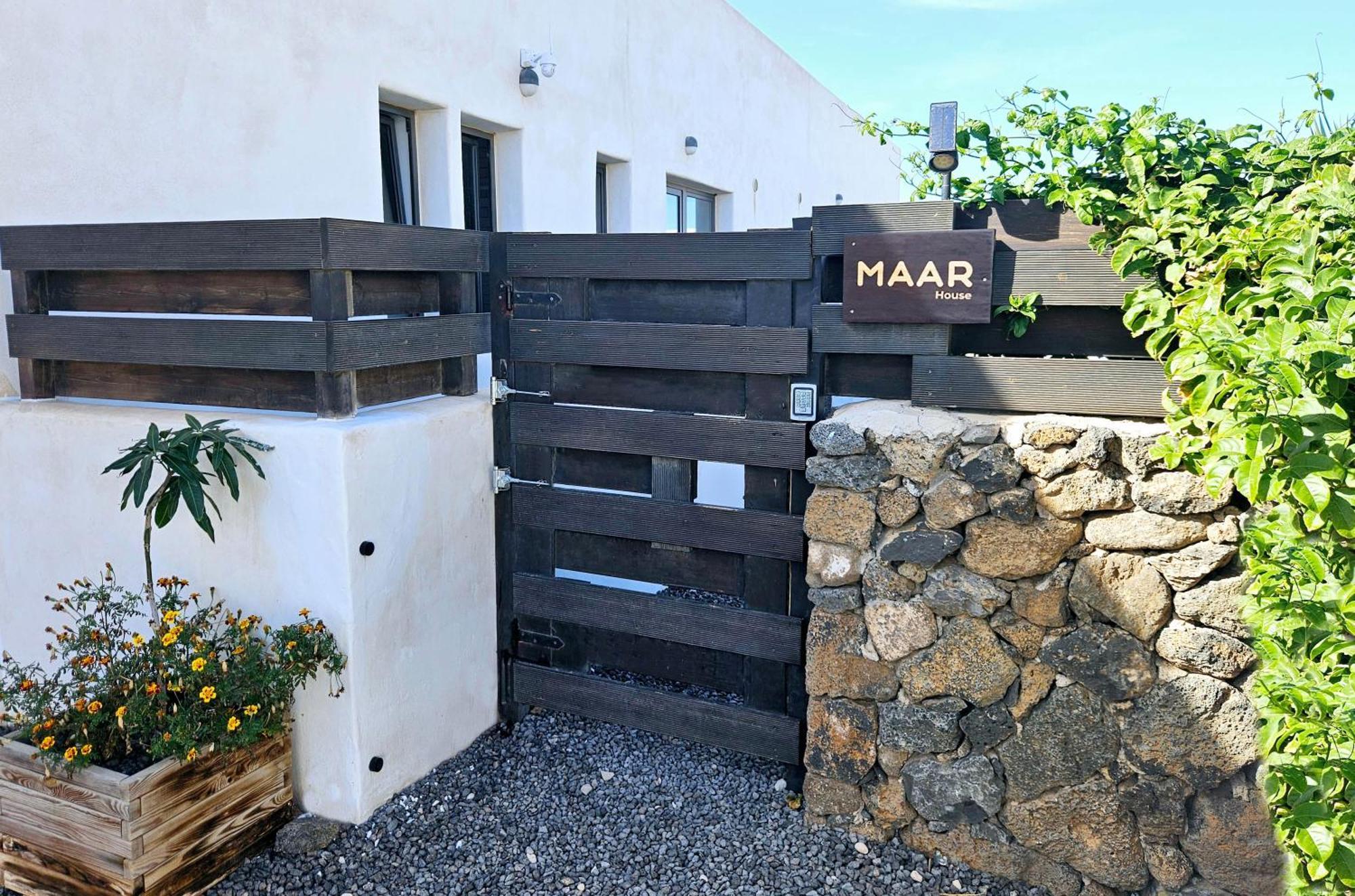 Maar House
