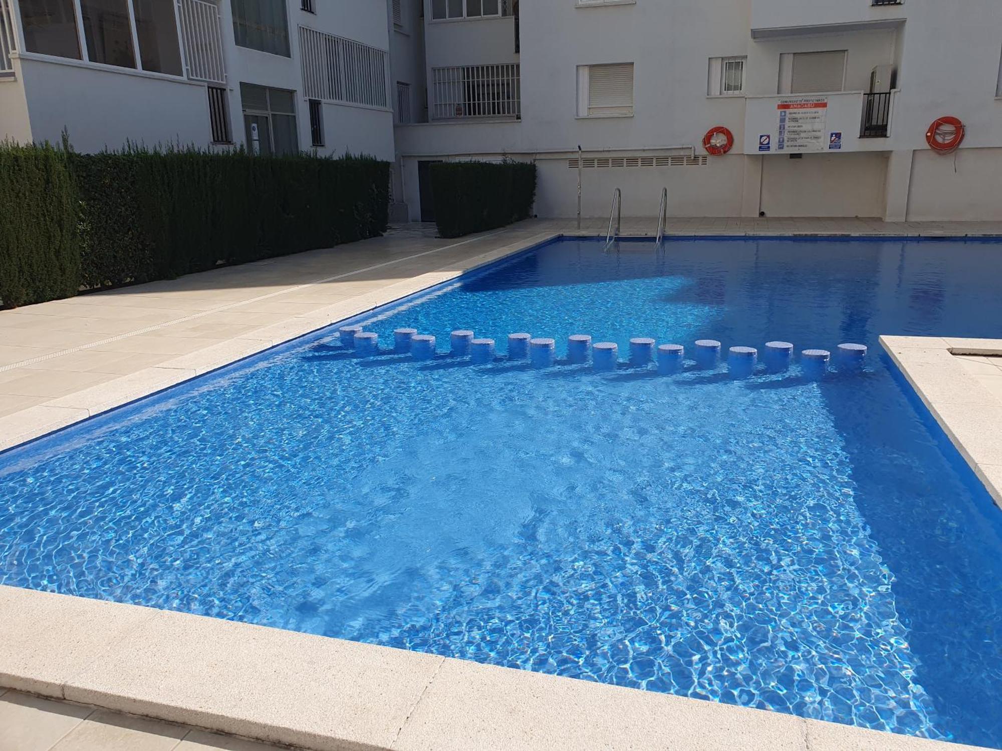 SALOU,Carrer de París, playa centro. Piscina. Apartamento Salou