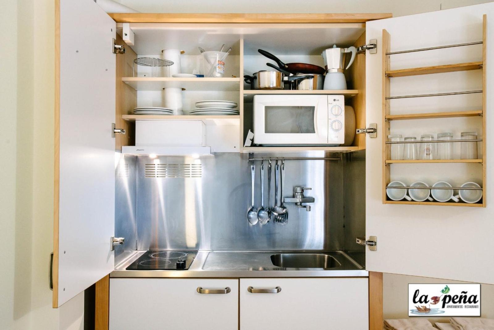 Apartamento Turísticos La Peña