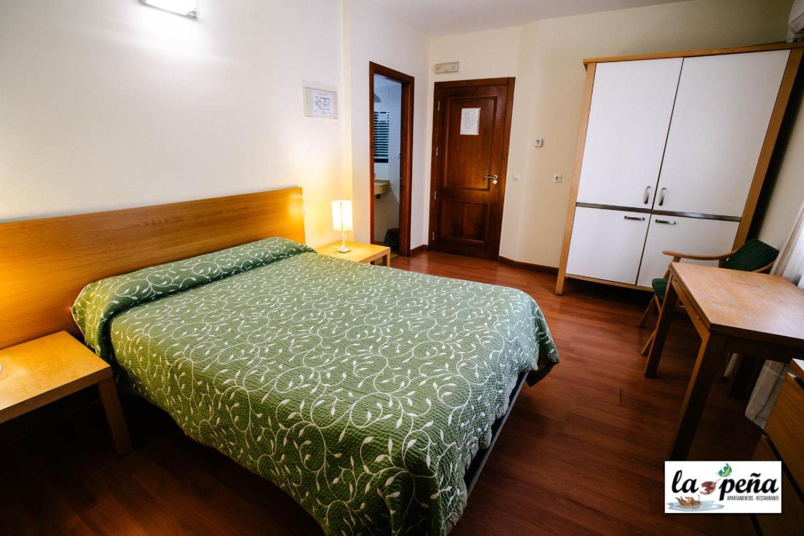 Apartamento Turísticos La Peña