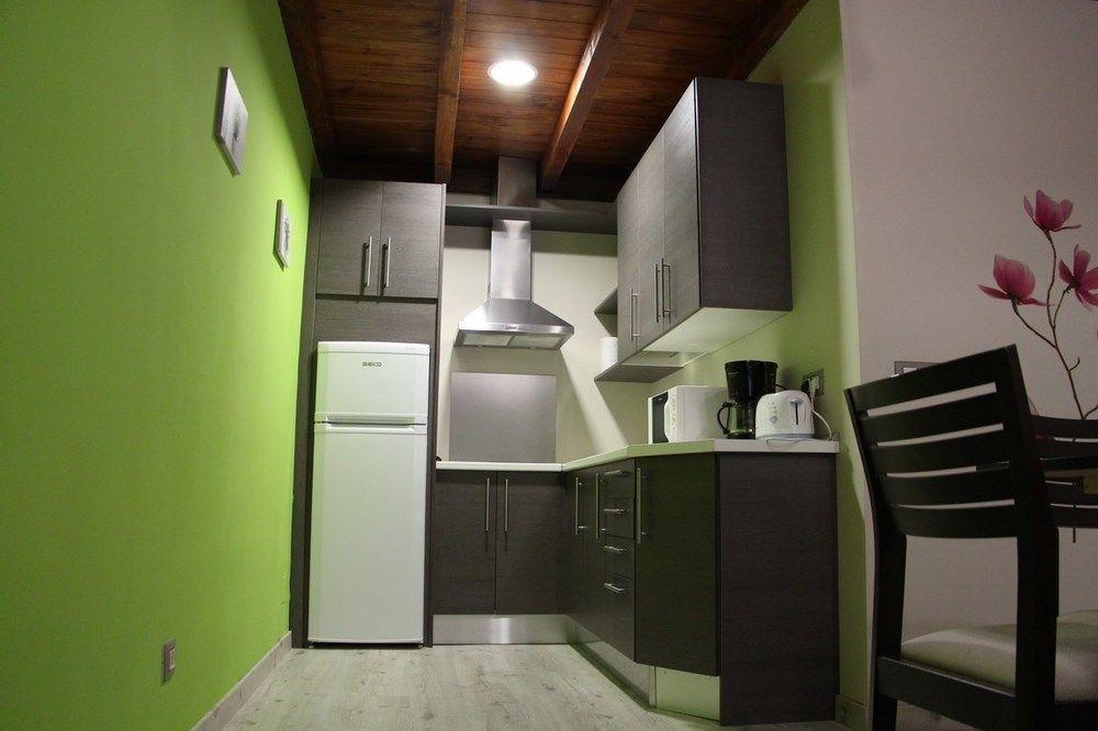 Apartamentos El Capricho Country house