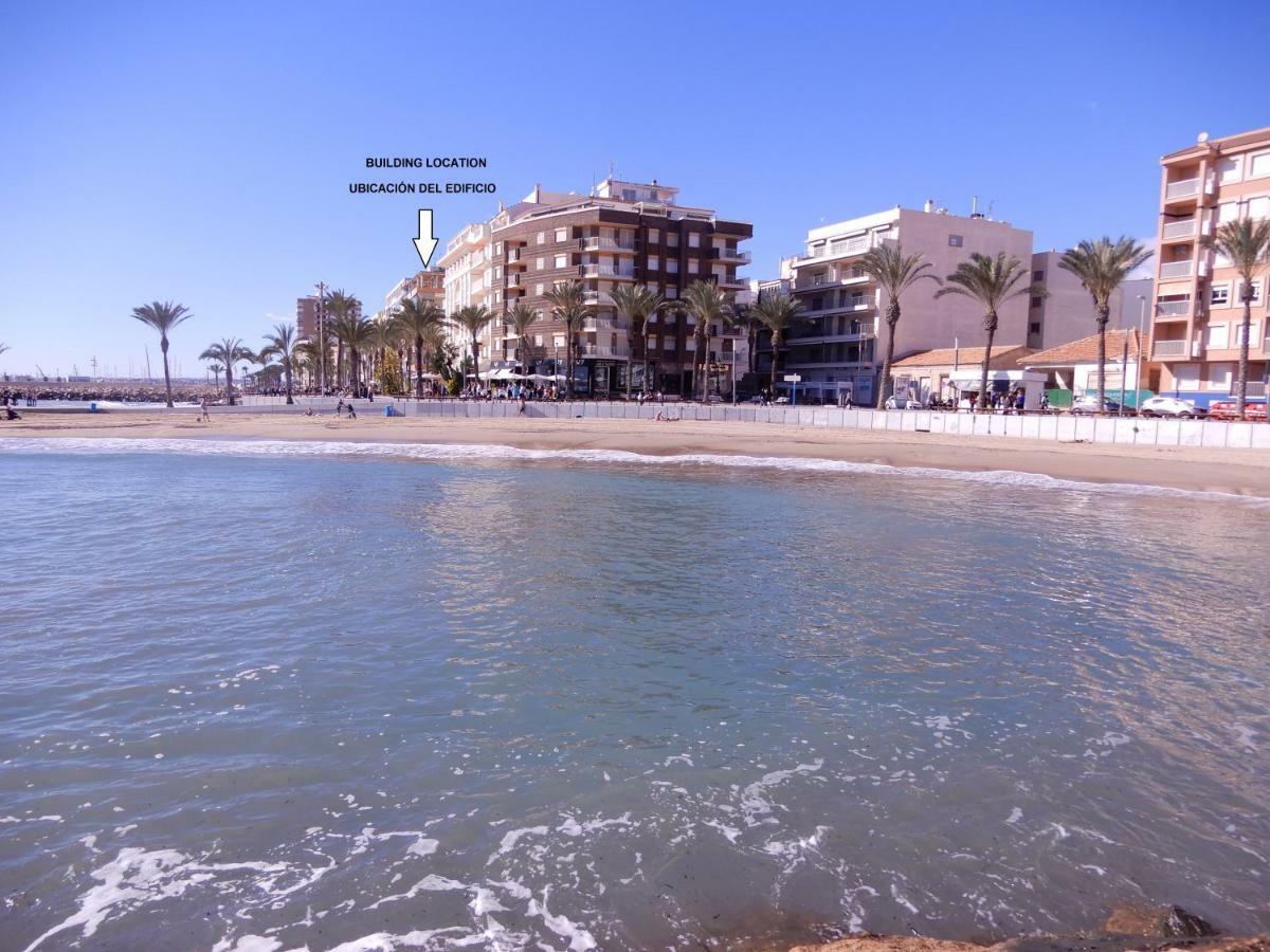 Edificio 1º Linea De Playa, En Paseo Maritimo De Torrevieja, Alicante, Costa Blanca * Torrevieja