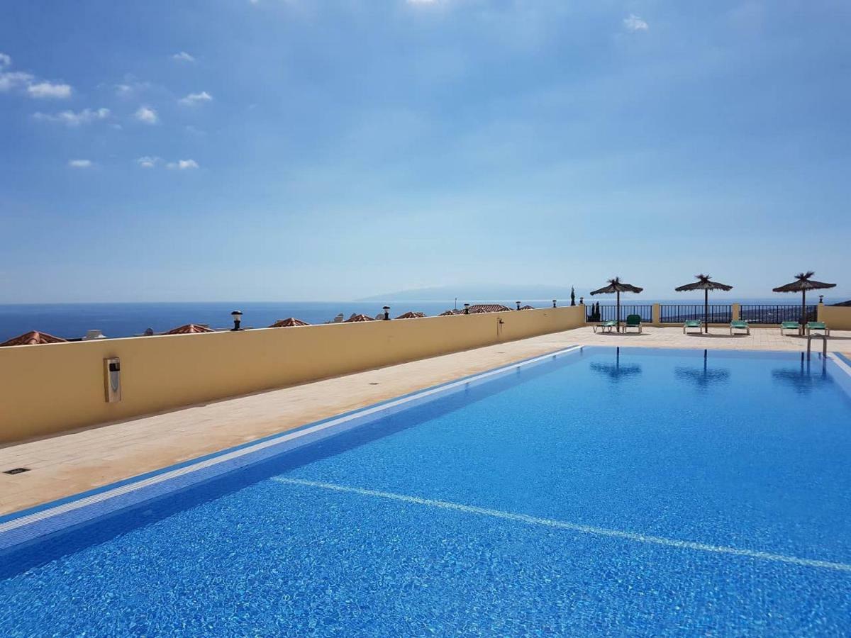 Сasa de vacaciones Roque Del Conde 3 With Fantastic Sea View, Terrace, Pool, Wifi, Sat-tv, Garage
