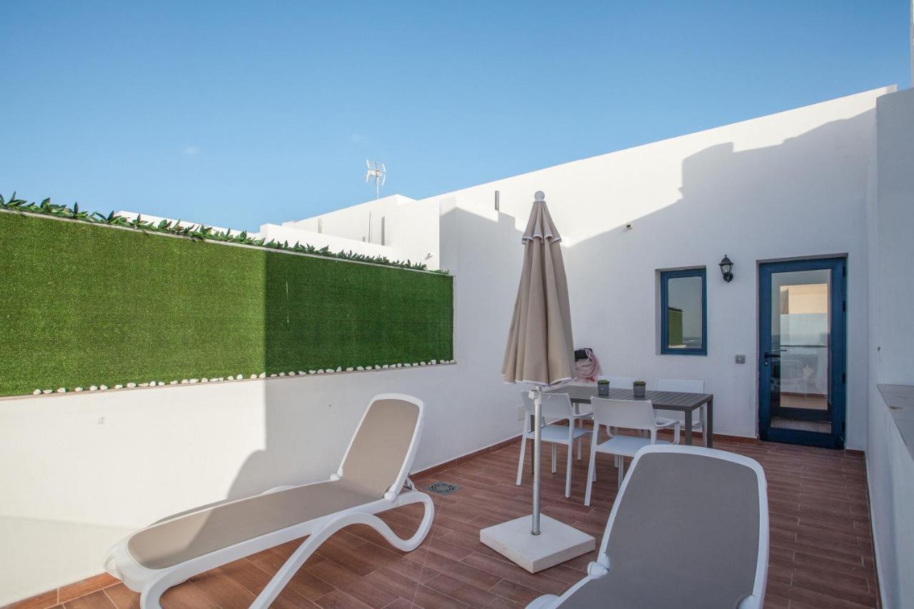 Vivienda 4 El Muellito Apartment *