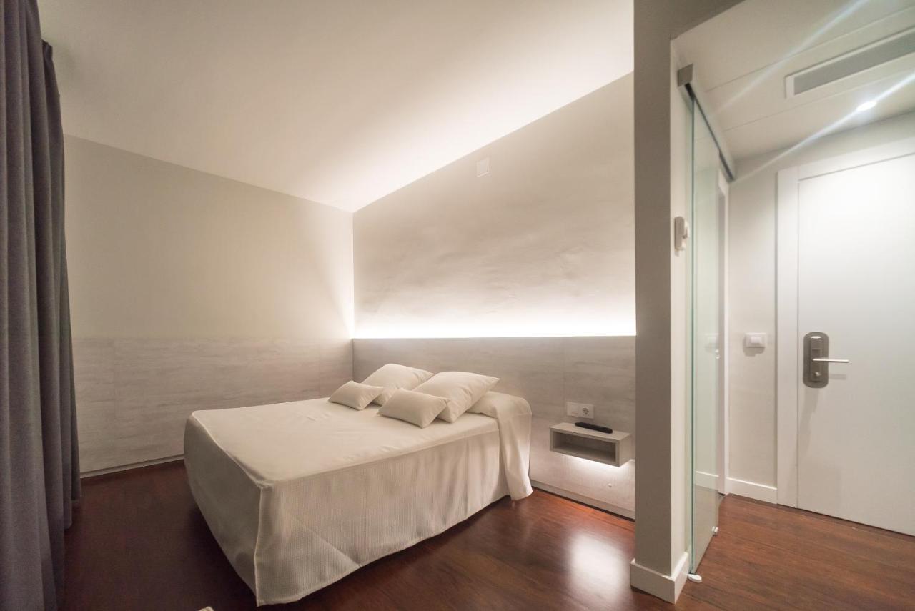 - Habitacions I Hotel