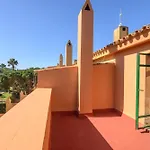 Adosado con jardín y piscina en Chiclana Barrosa-Sancti Petri
