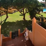 Adosado con jardín y piscina en Chiclana Barrosa-Sancti Petri