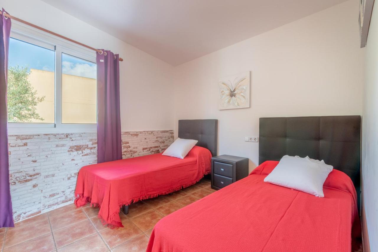 Holiday home Adosado Con Piscina Alcanada