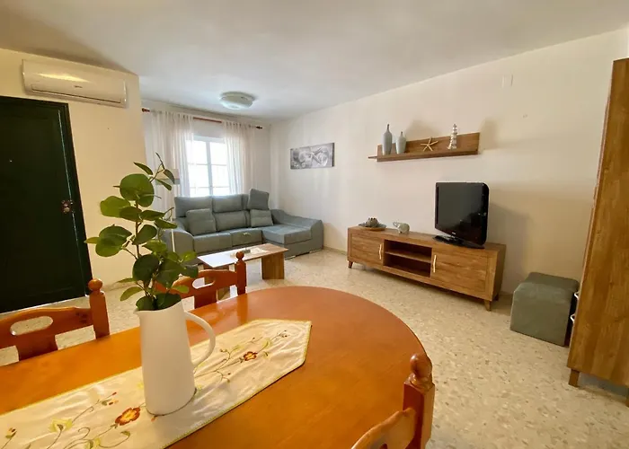 Chipiona/casa adosada/céntrico+playa/5plazas/garaje/