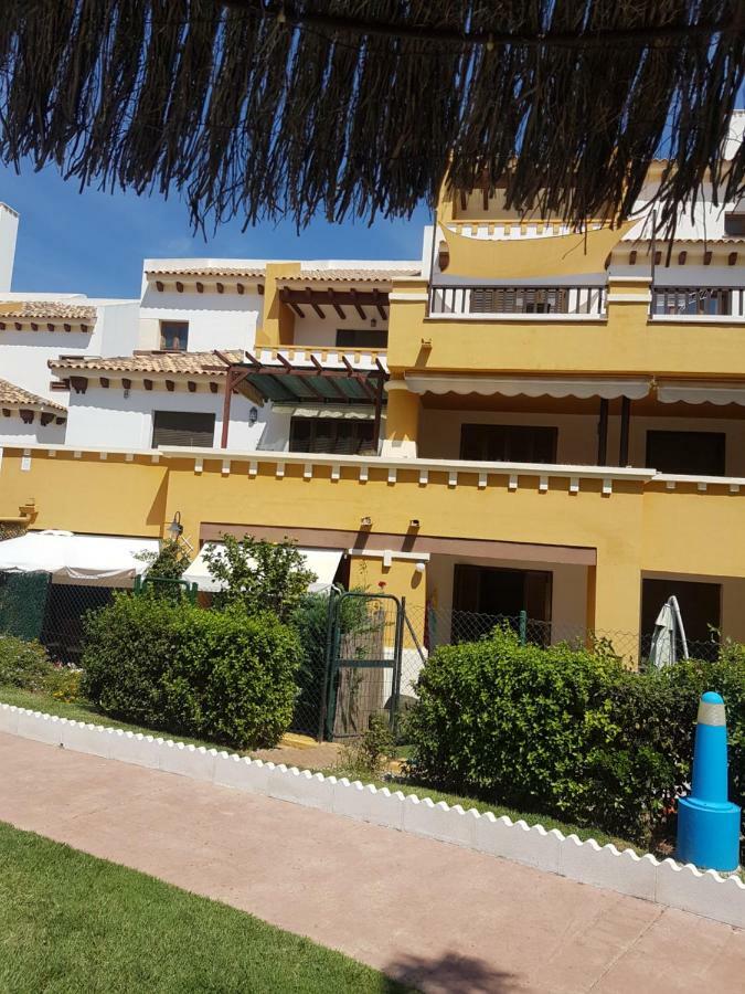 Costa Esuri, *